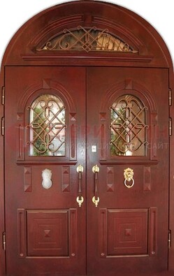 Стальная арочная дверь со стеклом и ковкой ДА-30 в дом из кирпича в Яхроме