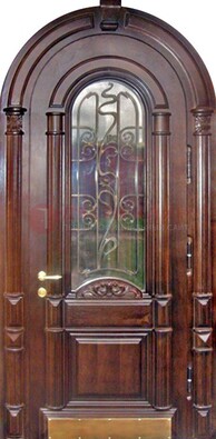 Арочная металлическая дверь массив со стеклом и ковкой ДА-50 в Яхроме