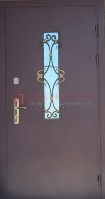 Металлическая дверь со стеклом и ковкой ДСК-77 в Яхроме